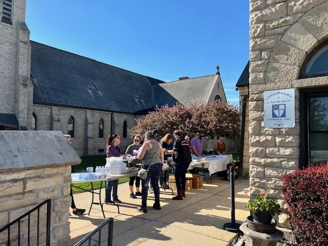 Volunteers serving the Friday Meal